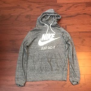 Woman’s Nike hoodie.